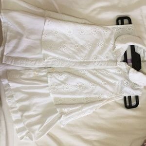 White sleeveless button down